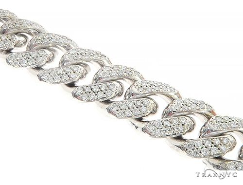 10K white gold Miami Cuban link bracelet with diamond accents and secure clasp