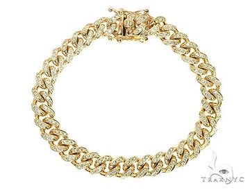 Men's diamond Cuban link bracelet in 10K yellow gold – flat link profile with round-set diamonds across face