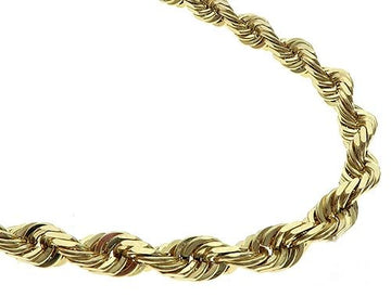 Solid 10K yellow gold diamond cut rope chain, 7mm width, close-up showing faceted link texture