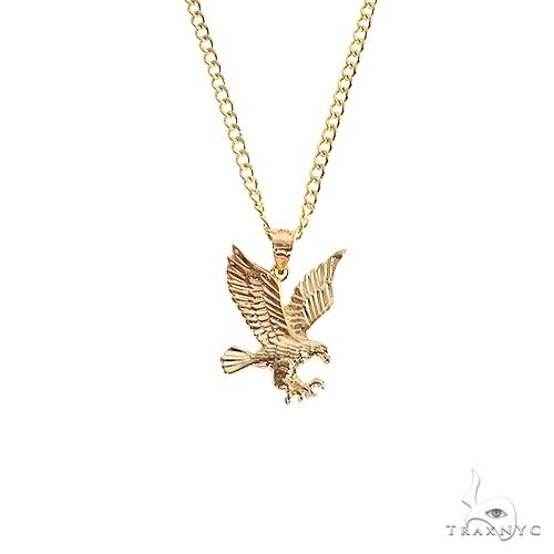 10K yellow gold eagle pendant set – spread-wing sculpture, front angle showing feather and body detail