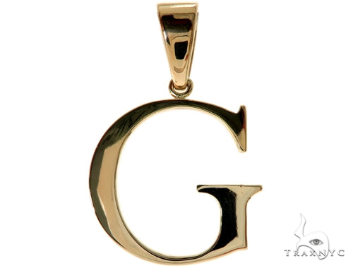 10K yellow gold pendant shaped as the letter G with a polished finish