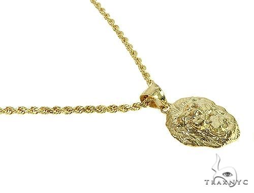 10K yellow gold lion head pendant on matching rope chain necklace