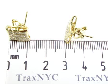 Yellow gold square men's earrings with pavé-set diamonds.