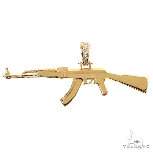 14K yellow gold AK-47 pendant with detailed rifle design and diamond-studded bail