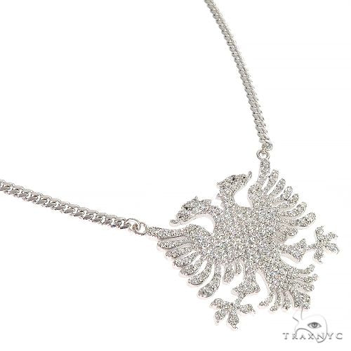 White gold double-headed eagle pendant with diamond accents on a chain necklace