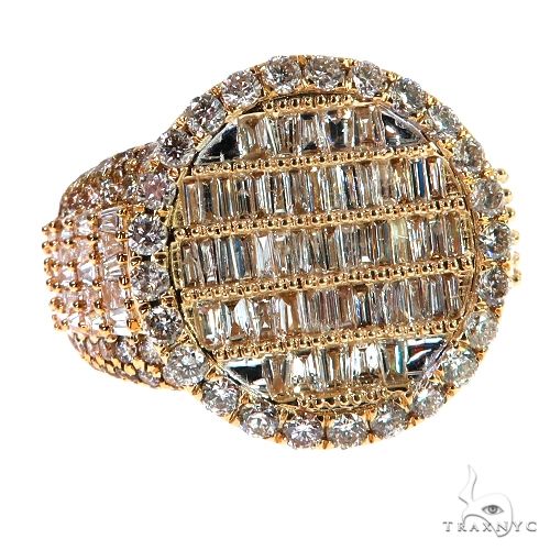 Yellow gold men’s ring with baguette and round diamonds in oval cluster design