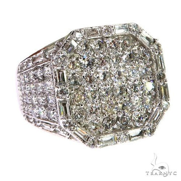 White gold men's ring with baguette and round diamonds in an octagonal setting.