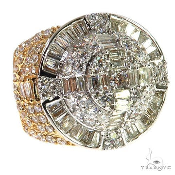 14K gold ring with round and baguette diamonds in a bold, circular design.