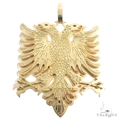 14K gold Albanian double-headed eagle pendant, front-facing view showing feather texture and spread wings