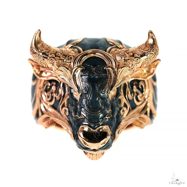 Rose gold 10K Taurus bull ring with black detailing and intricate engraved accents.