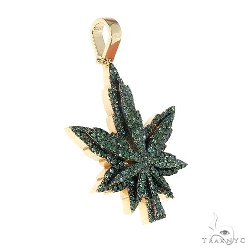 14K gold cannabis leaf pendant encrusted with green diamonds, yellow gold bail