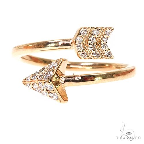 14K gold arrow ring with pavé diamond accents on open band design