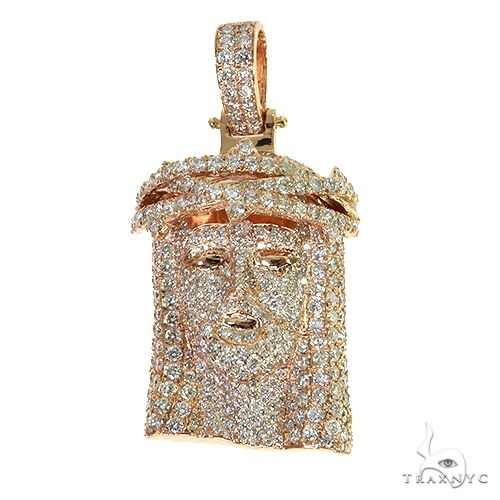 Small rose gold Jesus pendant encrusted with sparkling diamonds