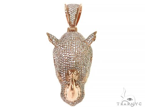 14K gold diamond rhino pendant – front view showing sculpted silhouette with diamond accents