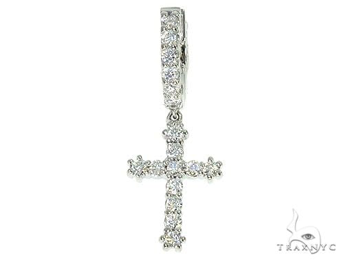 14K white gold single cross earring adorned with small sparkling diamonds