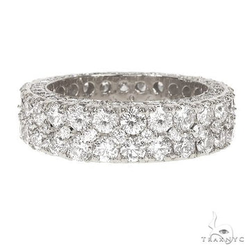 14K white gold men's eternity ring with three rows of round diamonds in a pave setting.