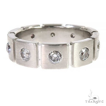 14K white gold men's eternity wedding band with rectangular diamond settings, size 9.5.