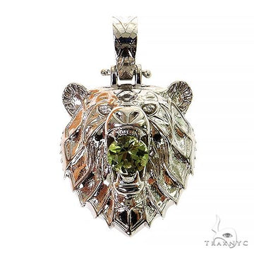 14K white gold grizzly bear pendant with detailed fur and green gemstone in open mouth.