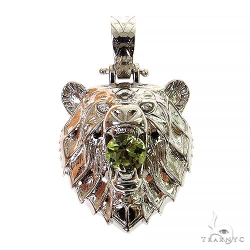 14K white gold grizzly bear pendant with detailed fur and green gemstone in open mouth