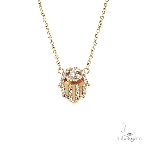 14k gold hamsa diamond necklace pendant with round-set diamonds across the hand motif, front view
