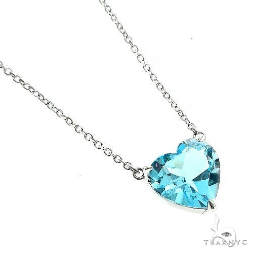 14K white gold necklace with heart-shaped aquamarine gemstone pendant