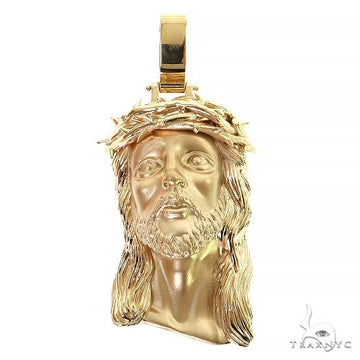 14K yellow gold Jesus pendant with detailed crown of thorns and textured hair.