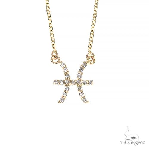 14k gold Pisces diamond pendant necklace on cable chain — front view of zodiac motif with diamond accents
