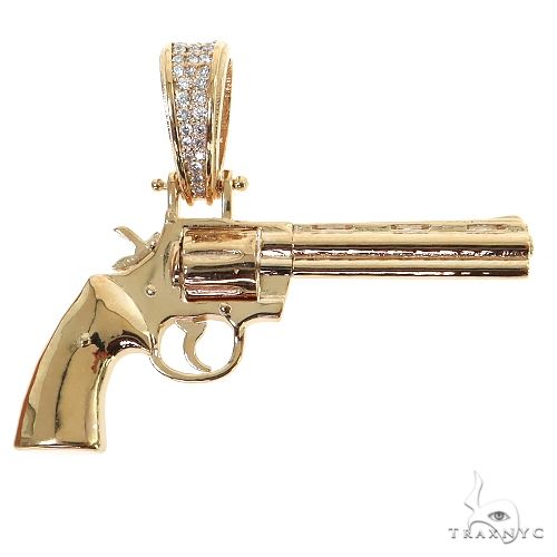 14K yellow gold revolver pendant with intricate detailing and pave diamond accents on bail