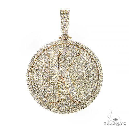 Diamond 'K' initial pendant in 14k yellow gold with prong-set round diamonds, front view