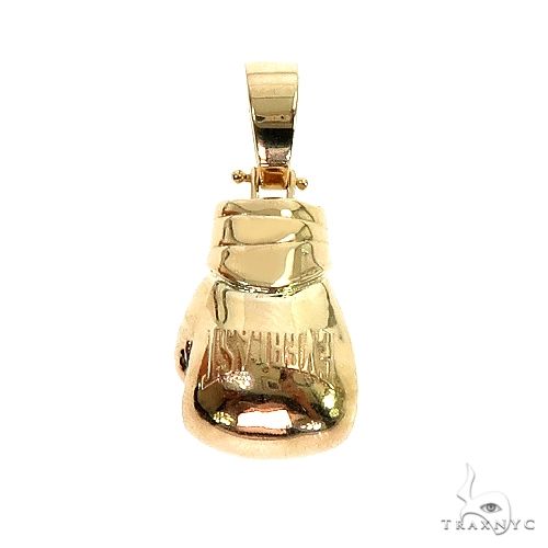 14K gold MMA boxing glove pendant, small size, front angle showing glove detail and lace texture