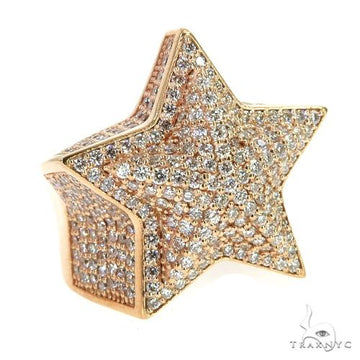 14K rose gold star ring encrusted with small sparkling diamonds.