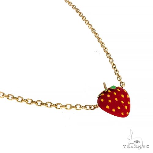 14K gold chain necklace with red strawberry charm and green leaf detail