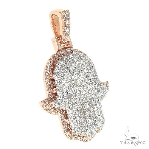 14K two-tone gold Hamsa pendant with pave diamond details and diamond-studded bail