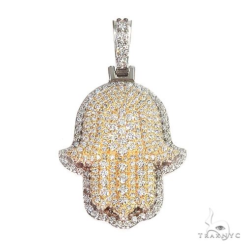 14K two-tone gold hamsa diamond pendant – front view showing yellow and white gold hand silhouette with diamond accents