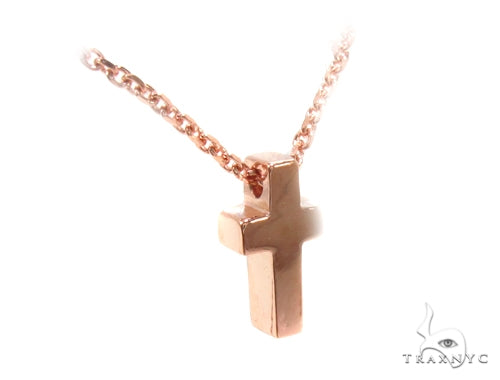 14K rose gold necklace with polished cross pendant on delicate chain