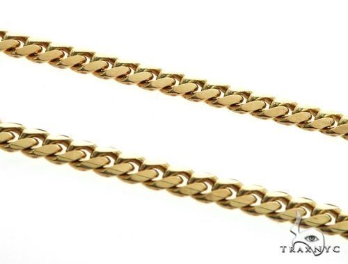 Solid 14k yellow gold Miami Cuban link chain – close-up of flat interlocking links