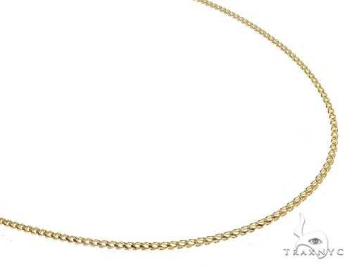14K yellow gold solid diamond cut Franco chain 1.5mm, close-up showing faceted link detail