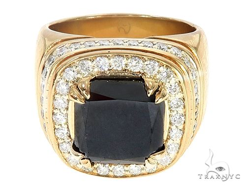 14K yellow gold ring with cushion-cut black diamond and surrounding white diamonds