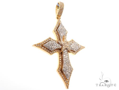 14K yellow gold cross pendant with diamond accents in a detailed, ornate design