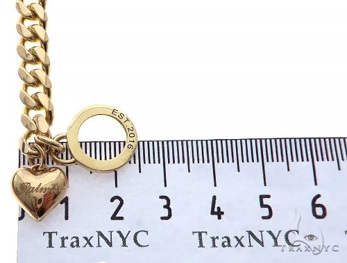 14K Yellow Gold Cuban Link Bracelet With Heart Charm And Toggle Clasp, photo 8 of 8
