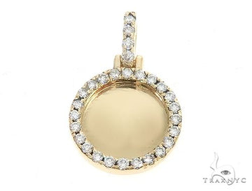 14K yellow gold round photo pendant with diamond halo and diamond-accent bail.