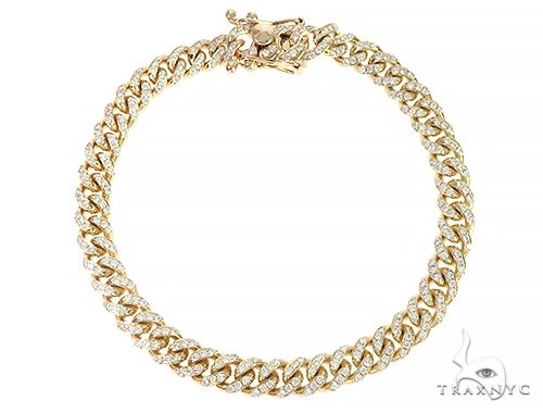 Men's Miami Cuban bracelet in 14K yellow gold with pavé-set natural diamonds across interlocking links
