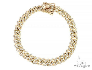 Men's Miami Cuban bracelet in 14k yellow gold with diamond-set links, front-facing flat lay