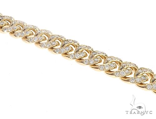 14K yellow gold Miami Cuban bracelet with diamond accents, men's luxury style