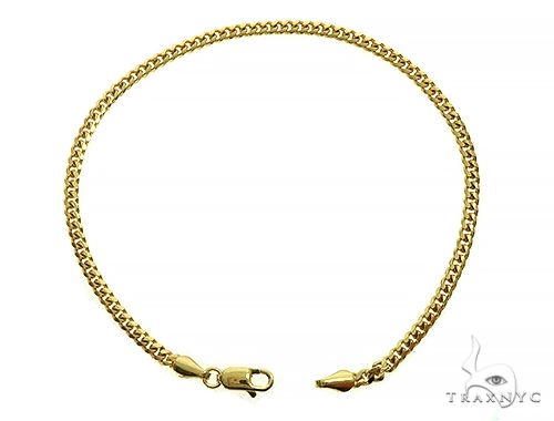 8-inch 2.6mm 14K yellow gold Miami Cuban link bracelet with secure clasp