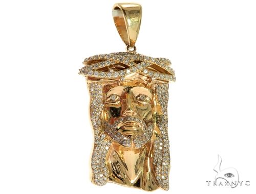 14K yellow gold Jesus pendant with prong-set diamonds on crown and face detailing