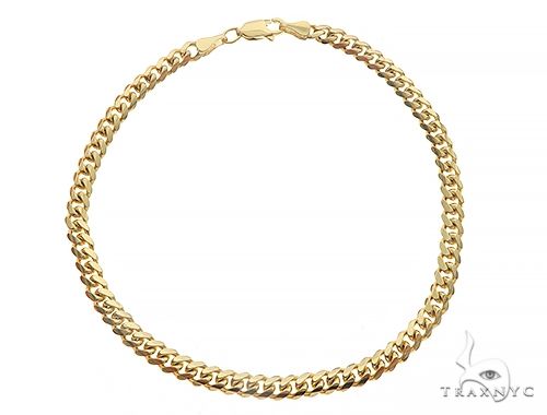 14k yellow gold solid Miami Cuban link bracelet, 3.5mm width, 8-inch length, close-up flat lay showing interlocking links