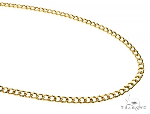 Solid 14K yellow gold curb chain 3mm width, flat interlocked links on white background