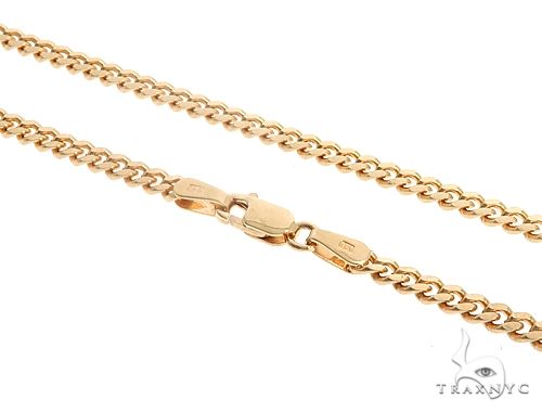 Solid 14K yellow gold 2.5mm Miami Cuban link chain, 20 inches, close-up showing uniform interlocking links