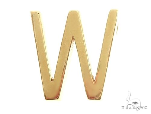 14K yellow gold pendant shaped as the letter W with a polished finish